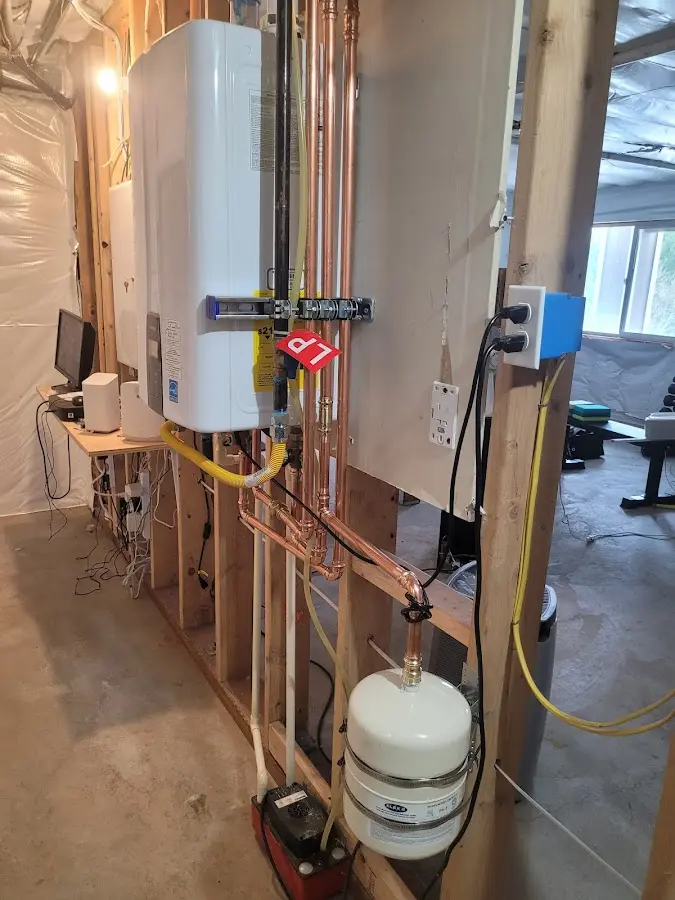 Licensed plumber repairing a kitchen sink in Staunton